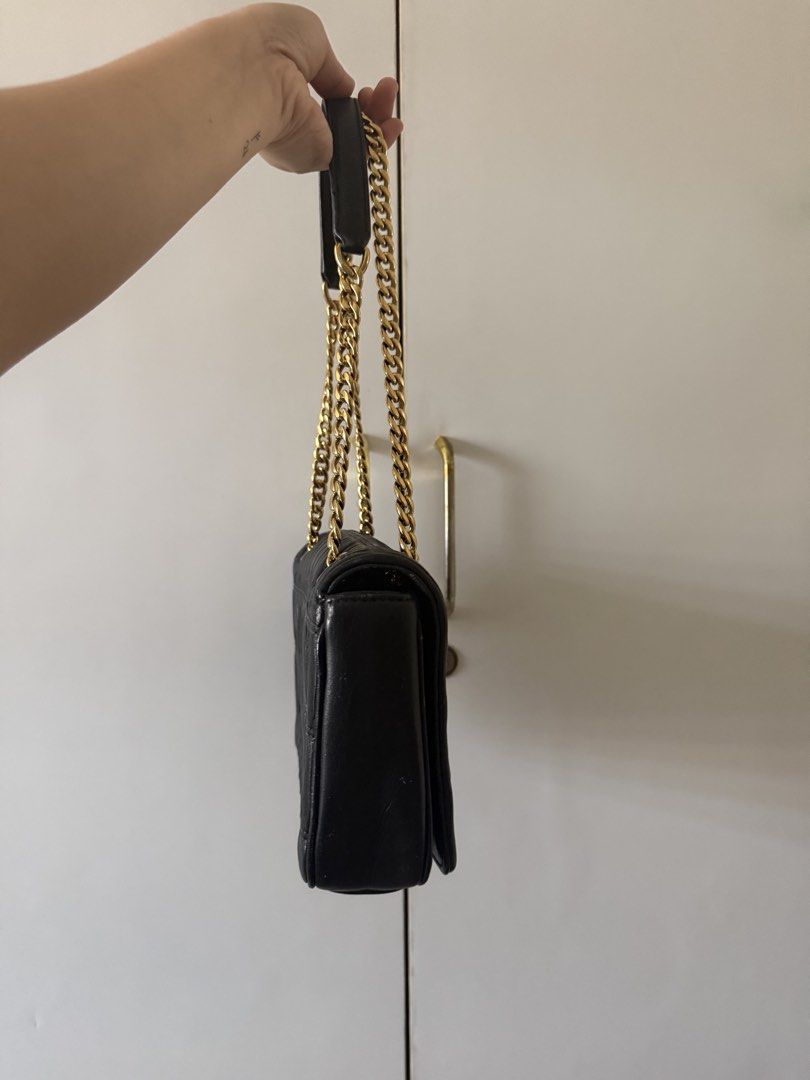 AUTHENTIC PRADA - black Prada Nappa Gauffre leather chain (Category: Luxury Bags & Wallets) located in Taguig. Submitted by vintagesoul888 (Listing ID 1431831411, Image 3). Description: PRADA handbag / shoulder bag black leather Minor flaws on the side Unique / limited design from Prada Authentic Rfs: decluttering.