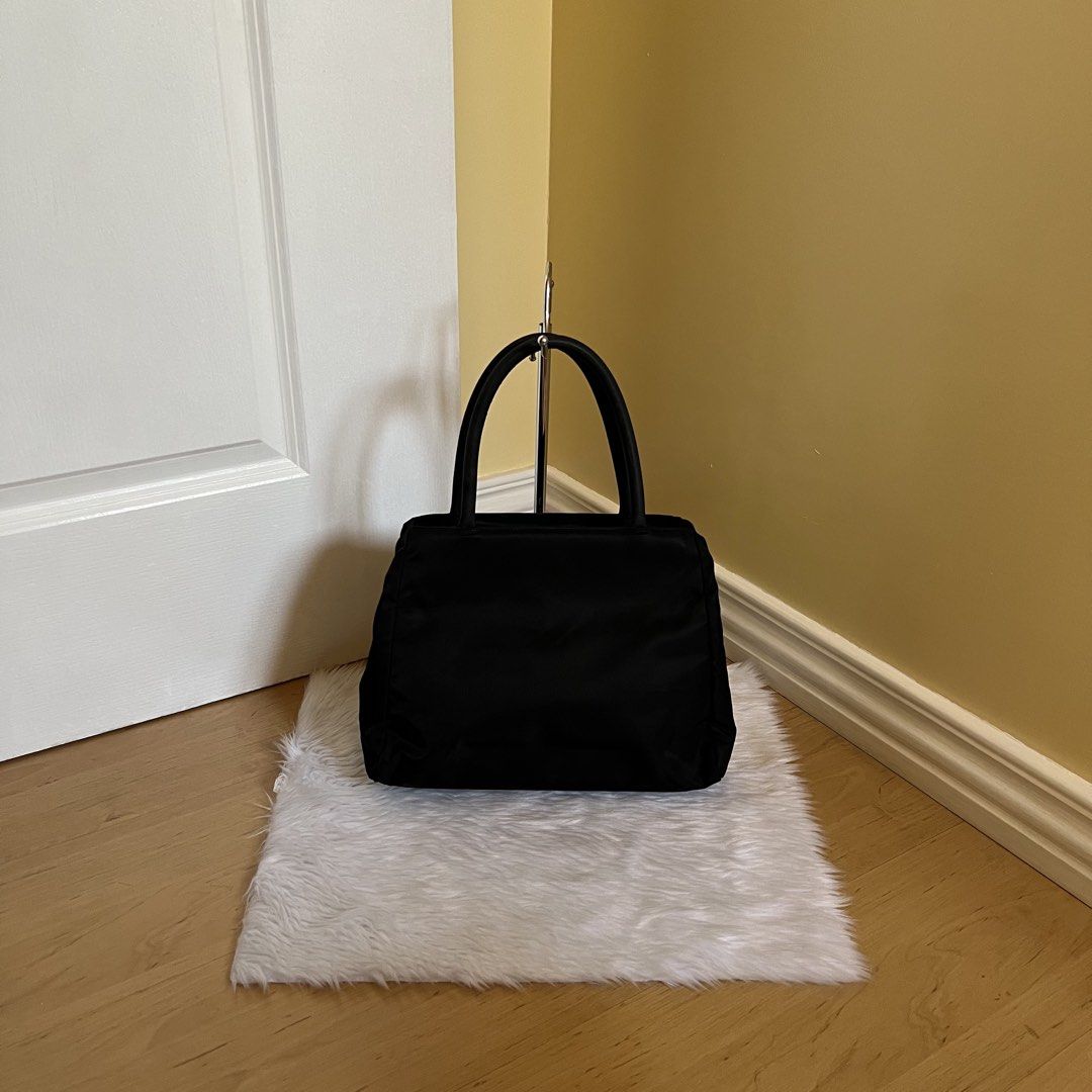 Authentic Preloved Prada Nylon Shoulder bag (Category: Luxury Bags & Wallets) located in Quezon City. Submitted by tokyoluxestuff2013 (Listing ID 1431813813, Image 3). Description: Authentic Preloved Prada Nylon Shoulder Bag No other inclusion Size approx only 32cm W x 24cm H Shipping via LBC/ Grab/ Lalamove Add shipping fee.