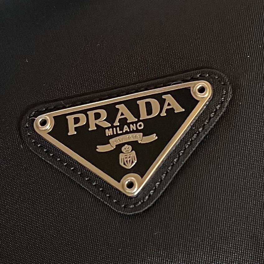 Authentic Preloved Prada Nylon Shoulder bag (Category: Luxury Bags & Wallets) located in Quezon City. Submitted by tokyoluxestuff2013 (Listing ID 1431813813, Image 2). Description: Authentic Preloved Prada Nylon Shoulder Bag No other inclusion Size approx only 32cm W x 24cm H Shipping via LBC/ Grab/ Lalamove Add shipping fee.