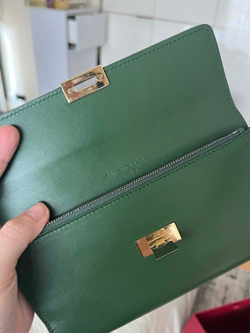 Balenciaga wallet (Category: Luxury Bags & Wallets) located in Pasig City. Submitted by cjdlcmp (Listing ID 1431807214, Image 2). Description: Flap wallet.