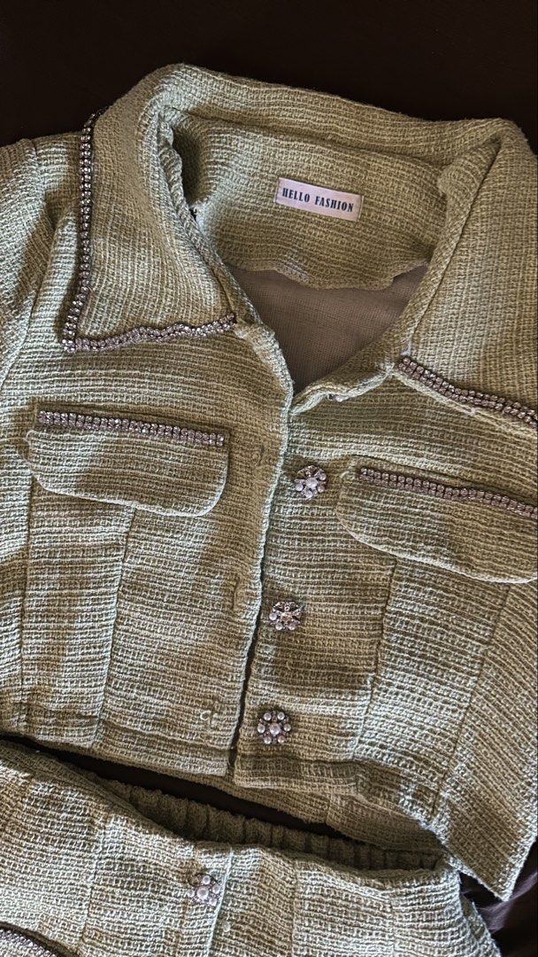 Bedazzled Tweed Terno Set (Category: Skirts) located in Paranaque City. Submitted by eckadcms (Listing ID 1431868869, Image 2). Description: Bought it in Thailand last 2024 — only used once ** Color may vary due to lightning —— Apple green color in actual ** Check the last two photos for the flaw Top - 32 - 34” Best fit 23 - 26 “ waist Strechable bottom, has a short inside & zipper on the side Delivery via grab, lalamove or J&T ( for cheaper opti