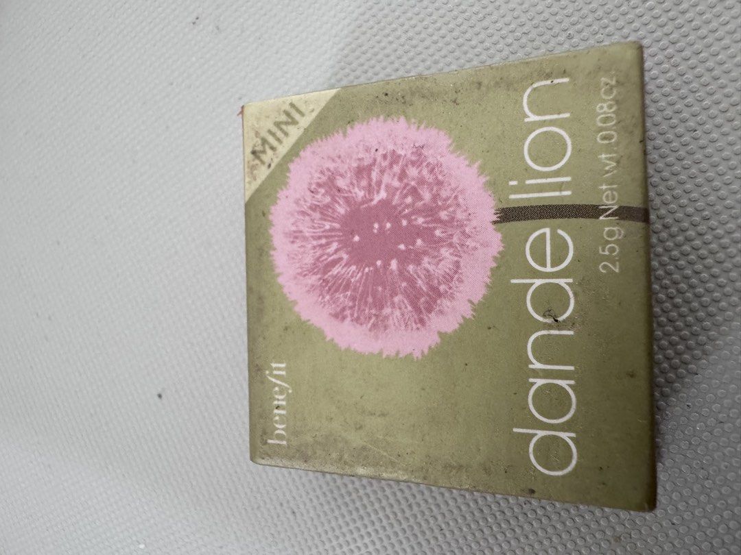 Benefit Dandelion Mini Blush (Category: Makeup) located in Manila. Submitted by decluterthings888 (Listing ID 1431836090, Image 2). Description: - Benefit Dandelion Mini blush - Pink shade - Mini size: 2.5g / 0.08 oz - Box features Benefit logo - Box includes the quote: "LAUGHTER IS THE BEST COSMETIC".