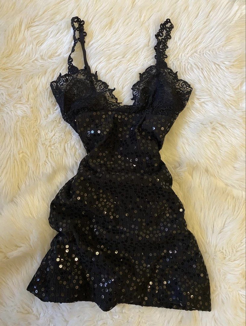 Black Sequin Mini Dress with Lace Detailing (Category: Dresses) located in Manila. Submitted by nobleearth-5d92 (Listing ID 1431937889, Image 1). Description: - Black mini dress - Embellished with sequins - Features delicate lace on straps and neckline - Flattering silhouette - Mini length - Slight sheen fabric.