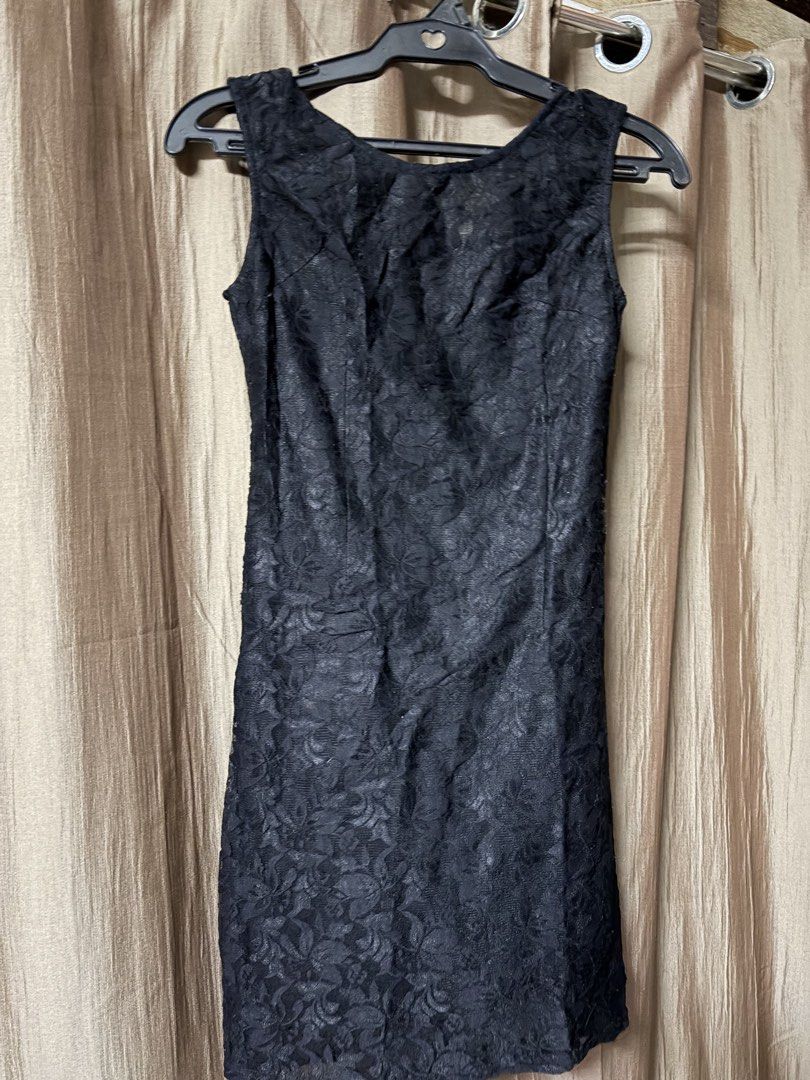 Black Sleeveless Lace Dress (Category: Dresses) located in Marikina City. Submitted by ms_marj (Listing ID 1431947089, Image 2). Description: - Black sleeveless dress - Delicate lace pattern - Scoop neckline - Fitted silhouette - Ideal for special occasions or evenings out.