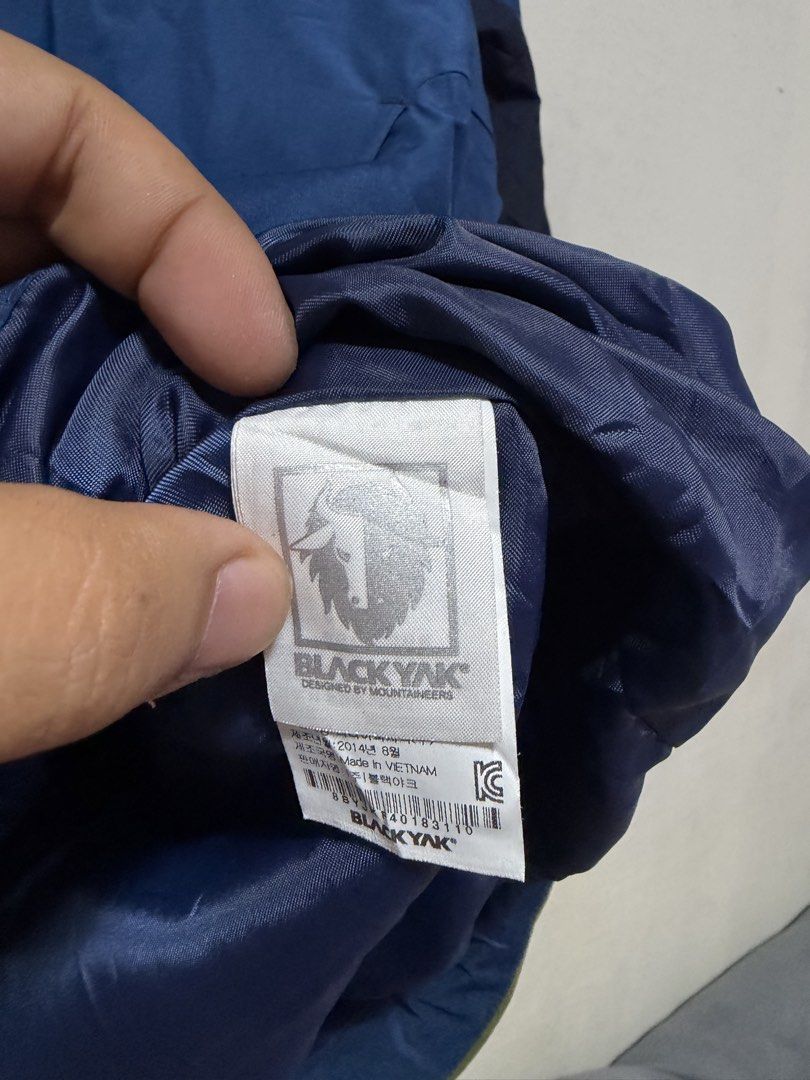 Black Yak Hooded Jacket (Category: Coats, Jackets and Outerwear) located in Manila. Submitted by nikaiah_finds (Listing ID 1431982020, Image 2). Description: -Excellent Condition -Dimes: L30xW25 - Black Yak hooded jacket - Color: Navy blue with olive green accents - Features a full-length orange zipper - Includes a hood - Black Yak logo on chest and back - Size: 110 - Made in Vietnam.