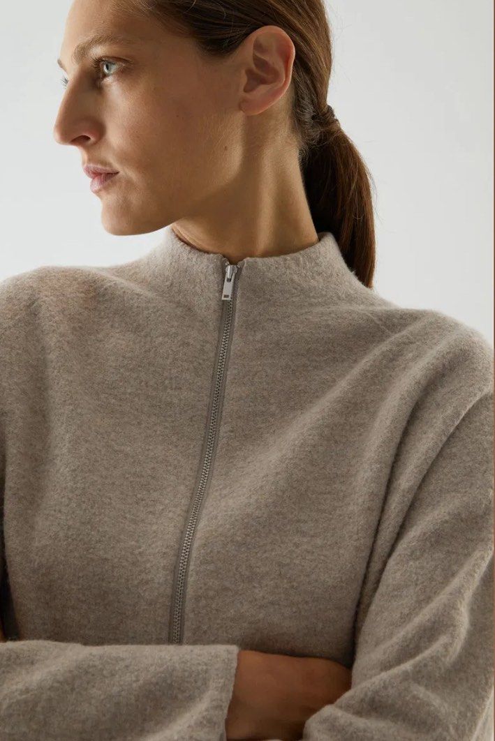 COS 100% Merino Wool Zip-Up Coat (Category: Coats, Jackets and Outerwear) located in Pasig City. Submitted by jamcy31 (Listing ID 1431856864, Image 2). Description: - COS wool coat, size XS, would best fit XS-S - Features a zip closure - Two front pockets - Stand-up collar - Made of 100% merino wool - Neutral color Used once then stored. This is great because it’s 100% wool and seems so light and thin but actually insulates warmth well!.