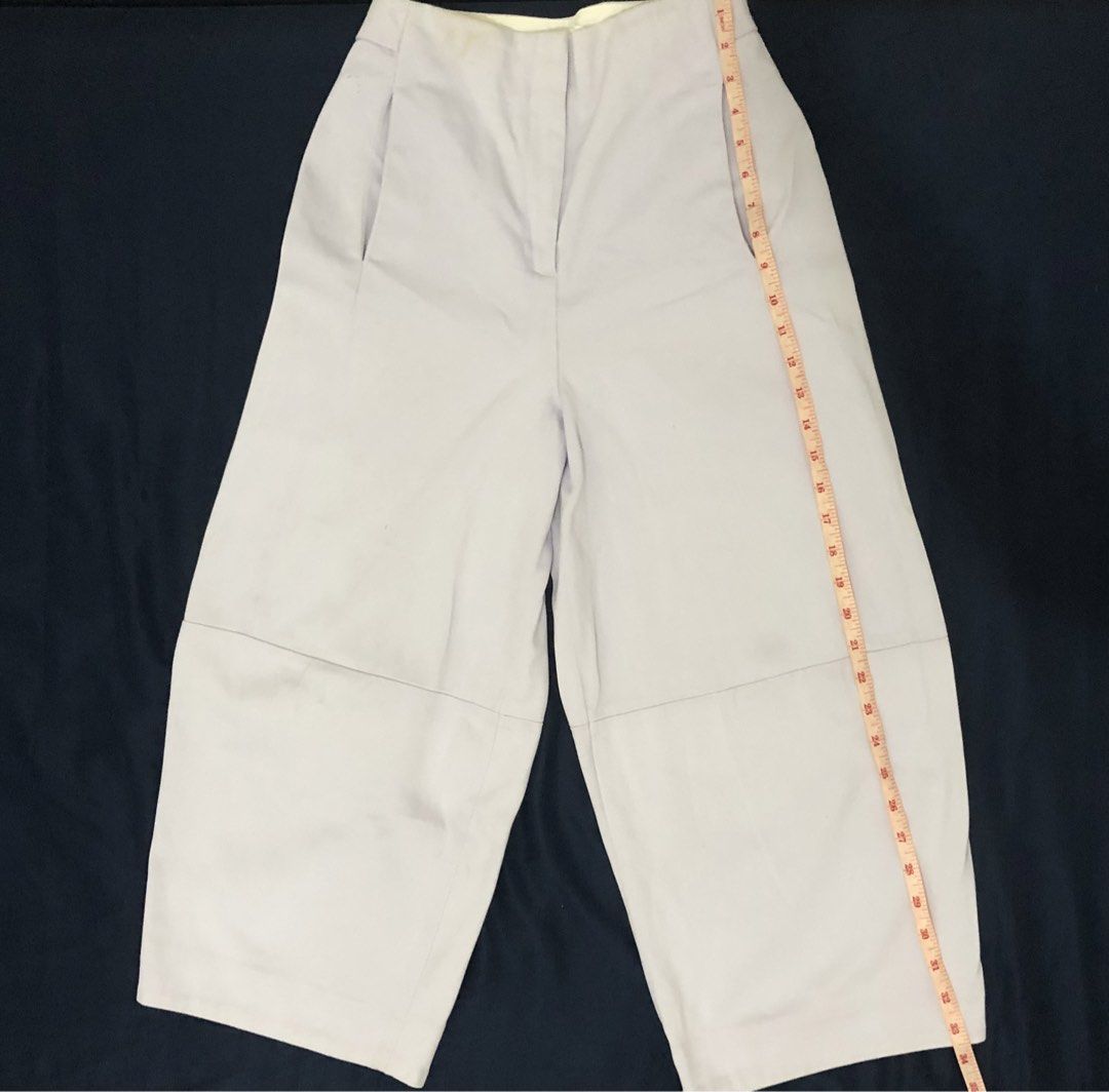 COS Lilac Wide Leg Pants (Category: Other Bottoms) located in Iloilo. Submitted by mintmovement.co (Listing ID 1431985037, Image 2). Description: All details are in the photos- inc some light flaws otherwise still in okay condition; no when worn - COS wide-leg pants - Light purple color - High-waisted - Size: 34 EUR - Features: Zipper and button closure, front and back pockets - Material: Cotton blend - Condition: Visible stains on waistband.