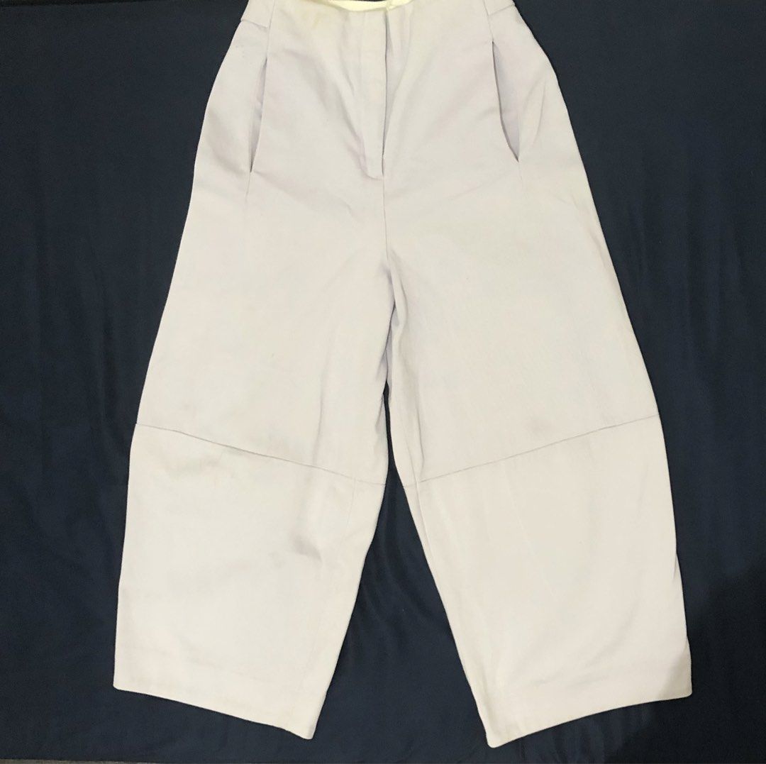 COS Lilac Wide Leg Pants (Category: Other Bottoms) located in Iloilo. Submitted by mintmovement.co (Listing ID 1431985037, Image 1). Description: All details are in the photos- inc some light flaws otherwise still in okay condition; no when worn - COS wide-leg pants - Light purple color - High-waisted - Size: 34 EUR - Features: Zipper and button closure, front and back pockets - Material: Cotton blend - Condition: Visible stains on waistband.