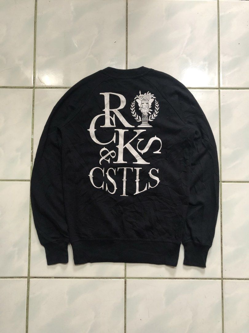Crooks & Castles Black Cardigan (Category: Coats, Jackets and Outerwear) located in Sipalay. Submitted by lptulak (Listing ID 1431945178, Image 1). Description: - Crooks & Castles cardigan - Black color - Button-down front - V-neck design - Brand logo on chest and back - Long sleeves - Ribbed cuffs - Soft fabric - Size tag visible.