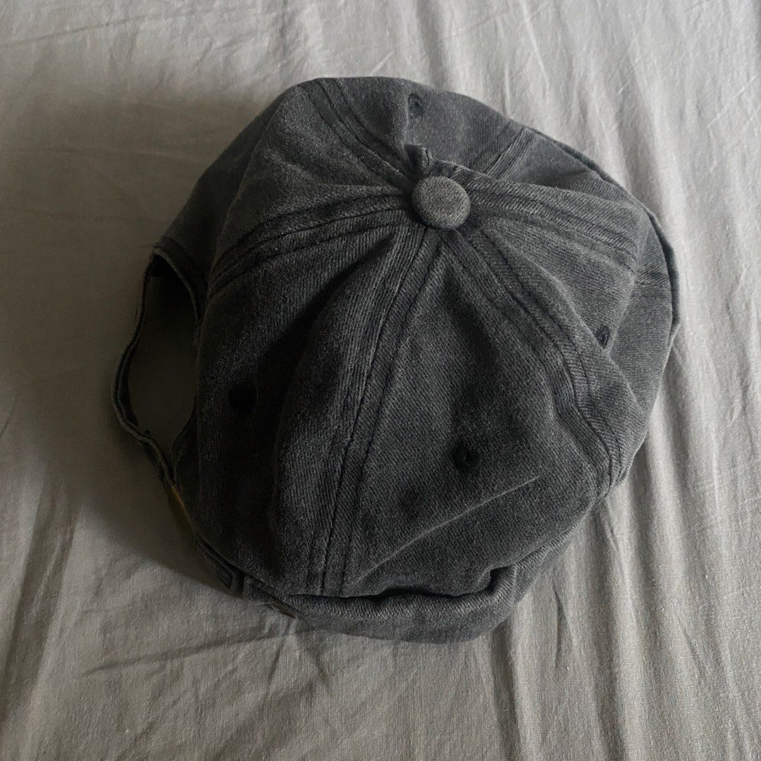 Dark Grey Denim Cap (Category: Caps & Hats) located in Makati City. Submitted by hyperdrive_mnl (Listing ID 1431826677, Image 1). Description: - Dark grey denim cap - Button detail on top - Curved brim - Adjustable strap at the back - Brass buckle - Comfortable and stylish Location: Near Circuit Makati.