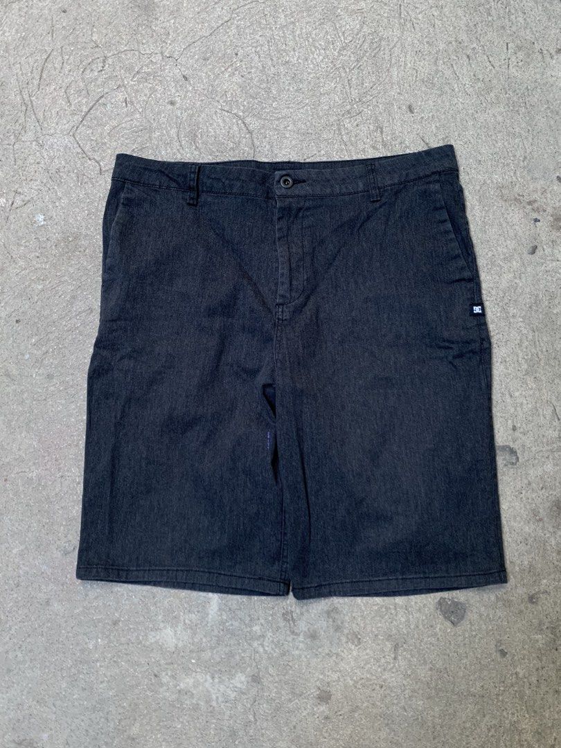DC Shoes Relaxed Fit Shorts (Category: Shorts) located in Roxas City. Submitted by vaultcultureco. (Listing ID 1431975731, Image 1). Description: - DC Shoes relaxed fit shorts - Dark grey color - Size 34/34 - Button closure - Multiple pockets - DC Shoes logo - Made in Cambodia - Relaxed fit - Designed in the USA - Suitable for casual wear.