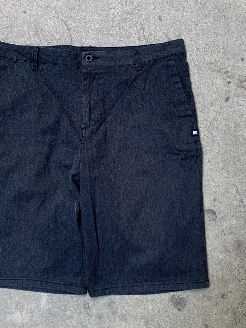 DC Shoes Relaxed Fit Shorts (Category: Shorts) located in Roxas City. Submitted by vaultcultureco. (Listing ID 1431975731, Image 2). Description: - DC Shoes relaxed fit shorts - Dark grey color - Size 34/34 - Button closure - Multiple pockets - DC Shoes logo - Made in Cambodia - Relaxed fit - Designed in the USA - Suitable for casual wear.