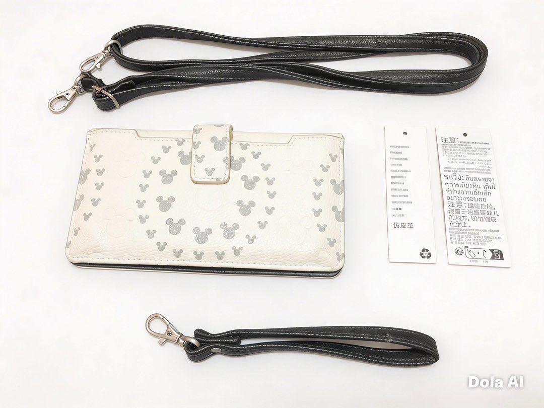 Disney Parks Mickey Mouse Wristlet with Shoulder Strap (Category: Wallets & Card holders) located in Taytay. Submitted by surprisespot (Listing ID 1431926744, Image 2). Description: Actual Photo Posted AUTHENTIC WHITE DISNEY PARKS MICKEY MOUSE WRISTLET WITH SHOULDER STRAP Never ko po ito nagamit. Natanggal ko lang tag nya dahil akala ko magagamit ko. RFS : Decluttering Condition is 8/10 May konting scratches sa gilid Need lang ng linis Negotiable
