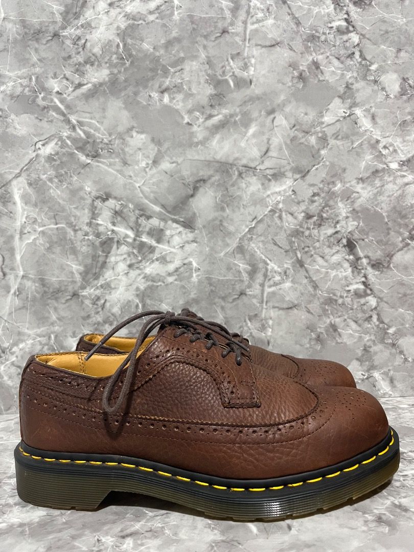 Dr. Martens Brogue Shoes (Category: Dress Shoes) located in Davao. Submitted by twistedswagger (Listing ID 1431805327, Image 1). Description: - Brown Dr. Martens brogue shoes - Classic wingtip design - Leather upper - Signature yellow stitching - Size: US 10, UK 9, EU 42 - Lace-up closure.