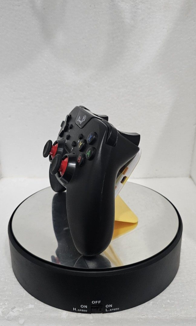Dino NS Wireless Controller (Category: Controllers) located in Baguio. Submitted by bitsbaguio (Listing ID 1431806397, Image 3). Description: - Black Duoqi wireless controller for Nintendo Switch, PC, PS3 - Includes original box - Features buttons and joysticks - Comes with a rotating display stand - Stand has an on/off switch - Never used.