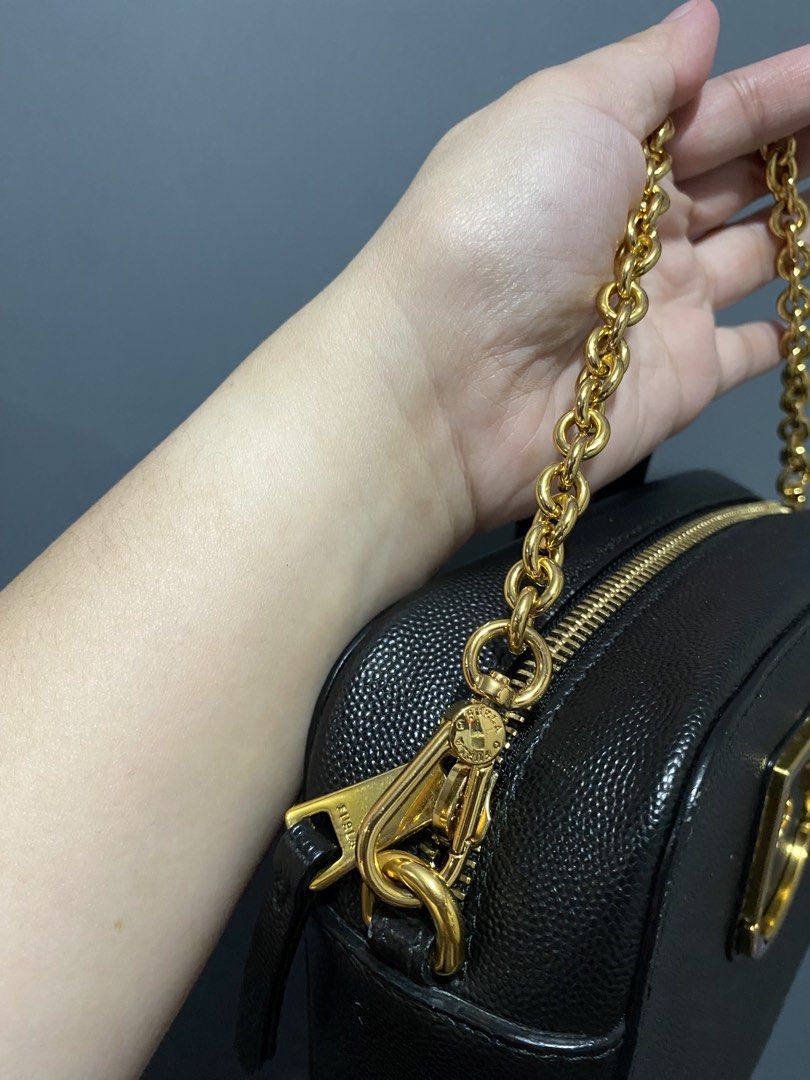 Furla Metropolis Mini Crossbody Bag (Category: Luxury Bags & Wallets) located in Batangas. Submitted by bagstolove3.0 (Listing ID 1431945403, Image 2). Description: - Authentic Furla Metropolis Mini crossbody bag - Color: Black - Gold-tone hardware - Chain strap - Zip closure - Furla logo detail - Interior includes Furla label and product tag - Made in Italy - Material: Genuine Leather.