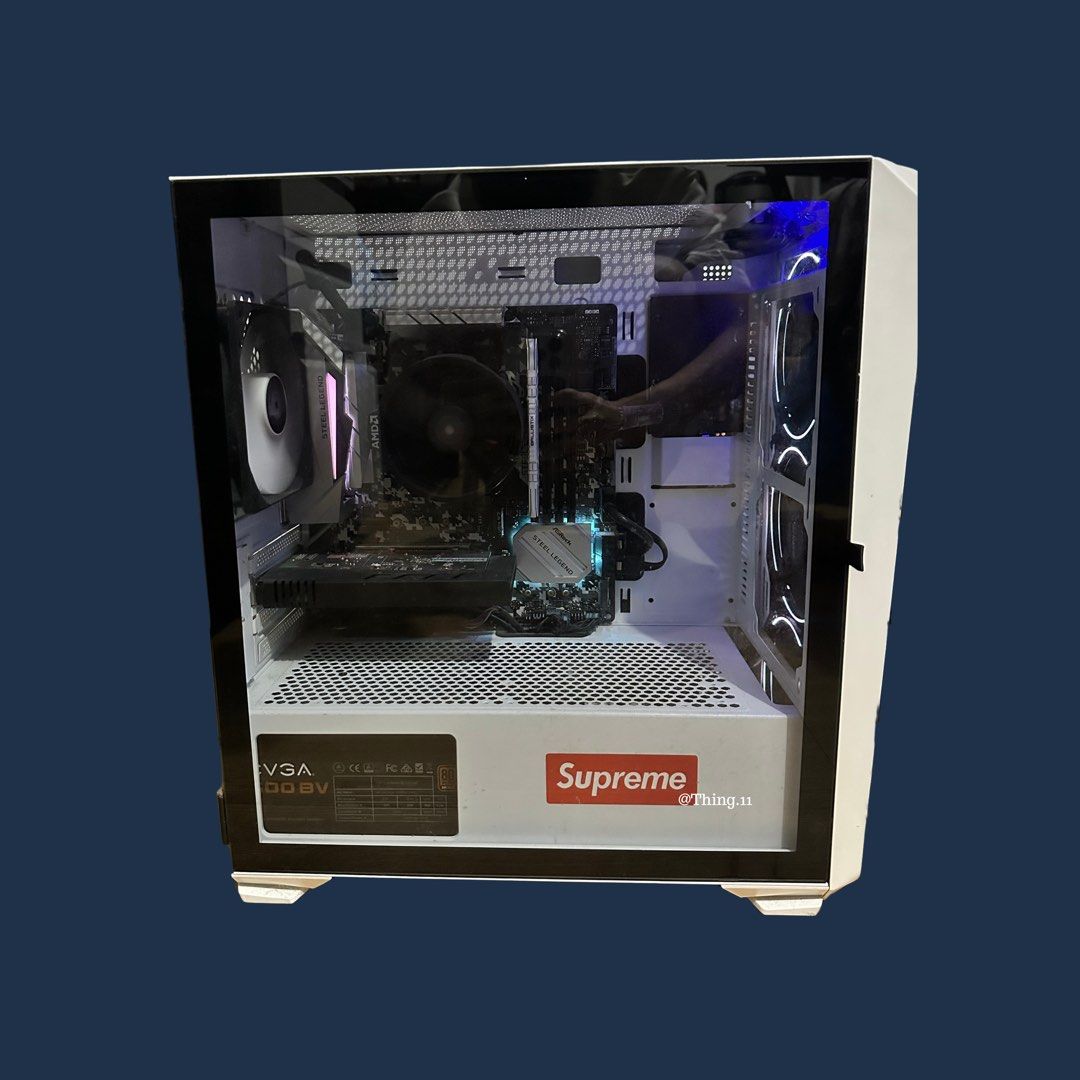 Gaming PC Ryzen 5 3500 (Category: Desktops) located in Pasig City. Submitted by things.11 (Listing ID 1431860009, Image 1). Description: - Custom-built PC with a Supreme-branded case - AMD Ryzen 5 3500 processor - 8GB RAM - NVIDIA GeForce GT 710 graphics card - Windows 10 Pro operating system - White case with glass side panel - B450M Steel Legend motherboard.