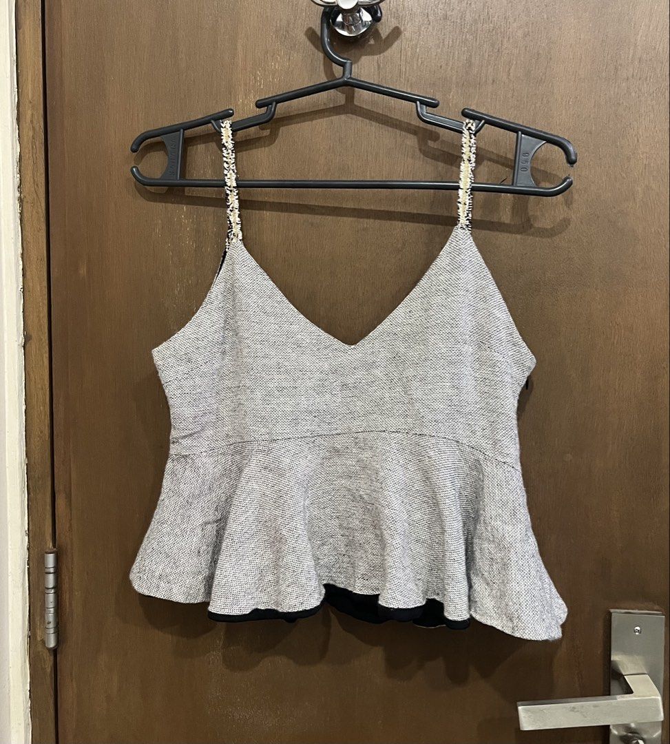 Grey Peplum Top with Embellished Straps (Category: Sleeveless) located in Manila. Submitted by mxinii (Listing ID 1431846431, Image 3). Description: - V-neckline - Contrasting black lining - Subtle shimmer fabric.