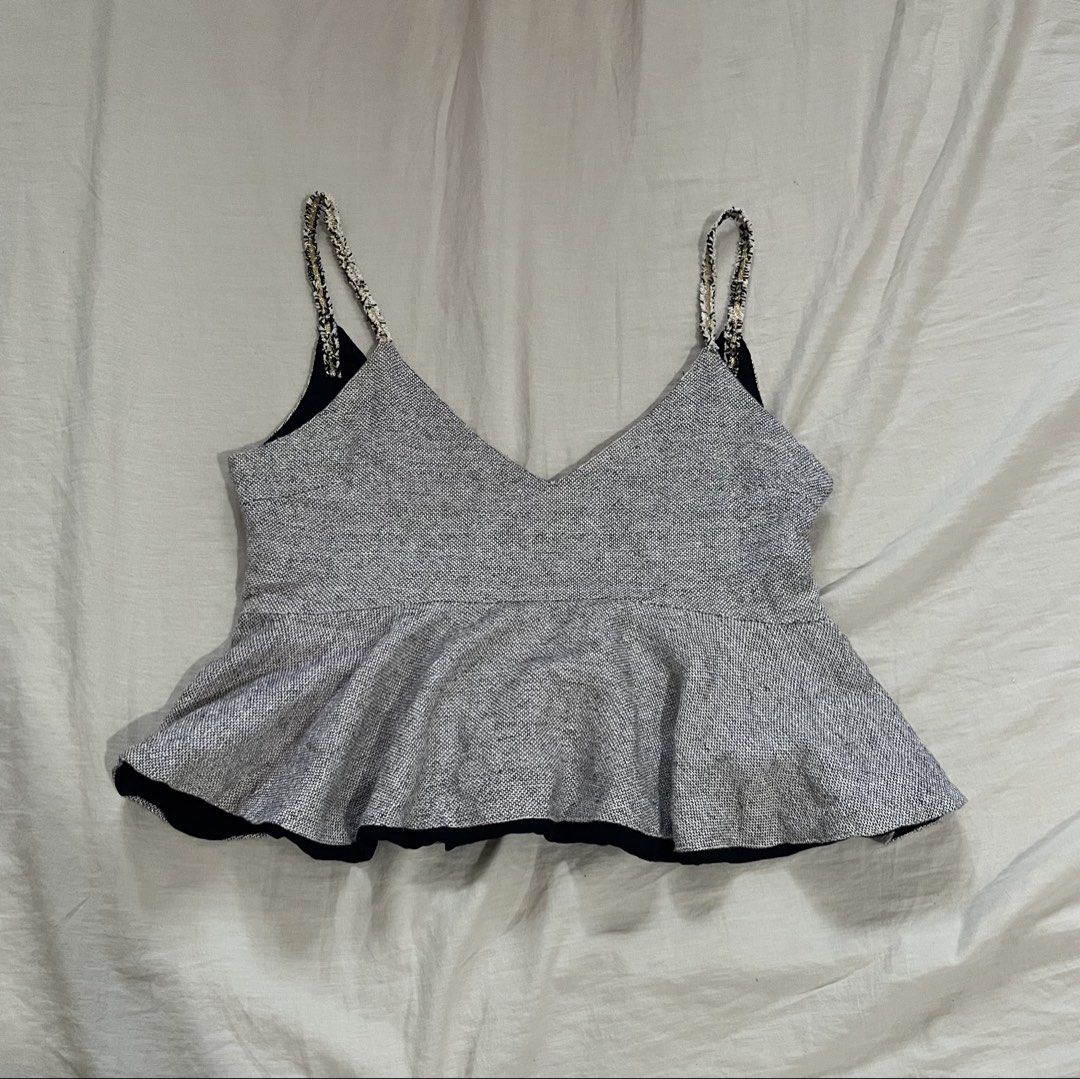 Grey Peplum Top with Embellished Straps (Category: Sleeveless) located in Manila. Submitted by mxinii (Listing ID 1431846431, Image 1). Description: - V-neckline - Contrasting black lining - Subtle shimmer fabric.