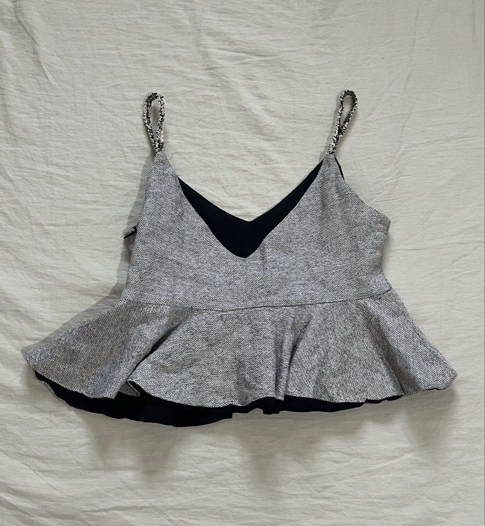 Grey Peplum Top with Embellished Straps (Category: Sleeveless) located in Manila. Submitted by mxinii (Listing ID 1431846431, Image 2). Description: - V-neckline - Contrasting black lining - Subtle shimmer fabric.