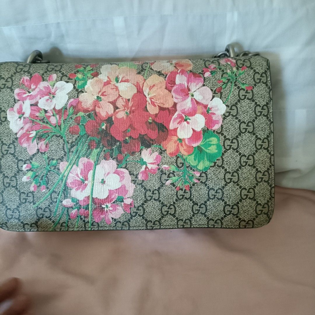 Gucci Dionysus Floral Shoulder Bag (Category: Luxury Bags & Wallets) located in Cainta. Submitted by prelovedbags06 (Listing ID 1431807155, Image 3). Description: - Authentic Gucci Dionysus shoulder bag - Stunning floral print - Elegant chain strap - Luxurious red interior - Secure flap closure with metal clasp - Multiple compartments for organization - Includes a convenient zippered pocket - Iconic Gucci GG pattern on the exterior - Serial numbe