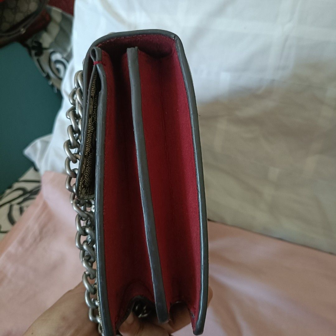 Gucci Dionysus Floral Shoulder Bag (Category: Luxury Bags & Wallets) located in Cainta. Submitted by prelovedbags06 (Listing ID 1431807155, Image 2). Description: - Authentic Gucci Dionysus shoulder bag - Stunning floral print - Elegant chain strap - Luxurious red interior - Secure flap closure with metal clasp - Multiple compartments for organization - Includes a convenient zippered pocket - Iconic Gucci GG pattern on the exterior - Serial numbe