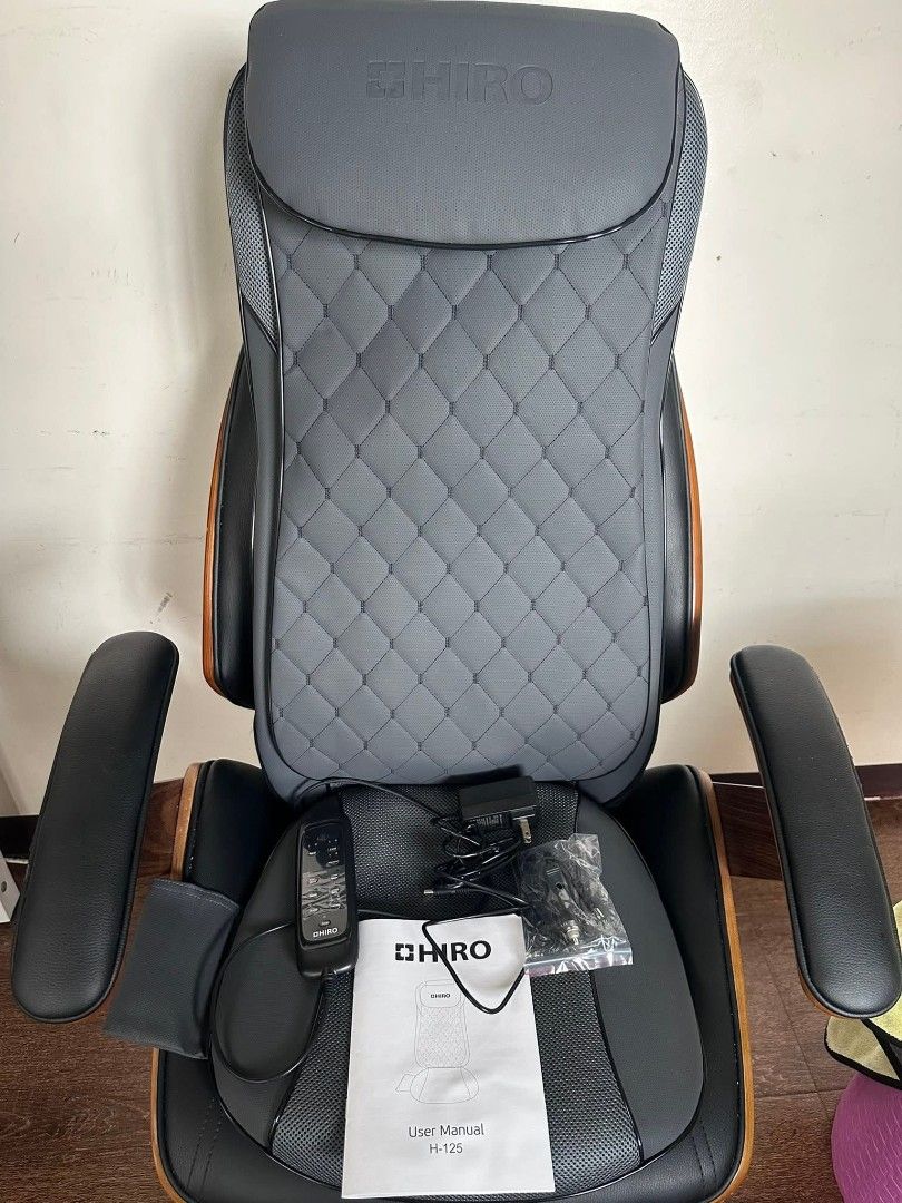 Hiro iBack Pro H-125 Massage Chair (Category: Chairs) located in San Mateo. Submitted by Adrian.Andrei (Listing ID 1431930473, Image 1). Description: Hiro iBack Pro H-125 massage chair with remote controller. Features 2D & 3D massage heads, 3 optional massage zones, and 2 intensity levels. It also has optional heat settings. The chair is gray and black with wooden accents. Includes a user manual. (negotiable price).