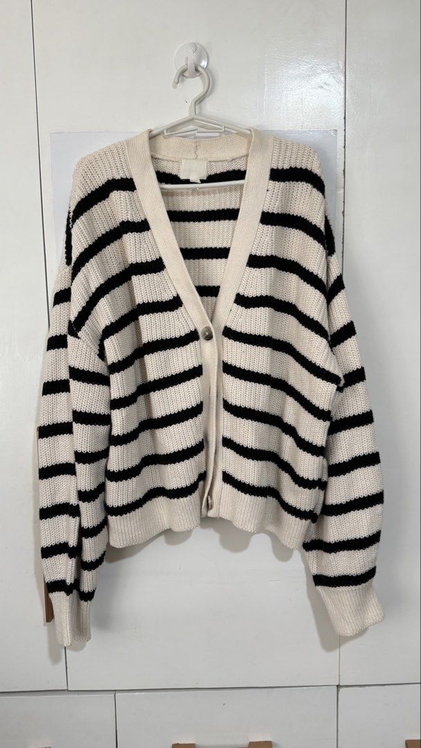 H&M Striped Cardigan - XL (Category: Coats, Jackets and Outerwear) located in Carmen. Submitted by vraorng (Listing ID 1431847737, Image 1). Description: - H&M striped cardigan - Color: Black and cream - Size: XL - Features: V-neck, button closure - Material: Knit - Perfect for layering Only used once for a trip Original H&M - Size XL Shipping from Bohol via J&T.