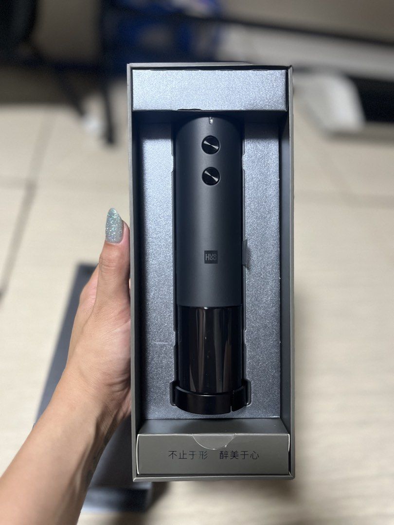 HUOHOU Electric Wine Opener (Category: Other Kitchenware & Tableware) located in Pasay City. Submitted by 2ndloveforever2023 (Listing ID 1431971899, Image 1). Description: - HUOHOU Electric Wine Opener - Black color - Box features brand name and stylized "M" - Box includes product information (manufacturer, production date).