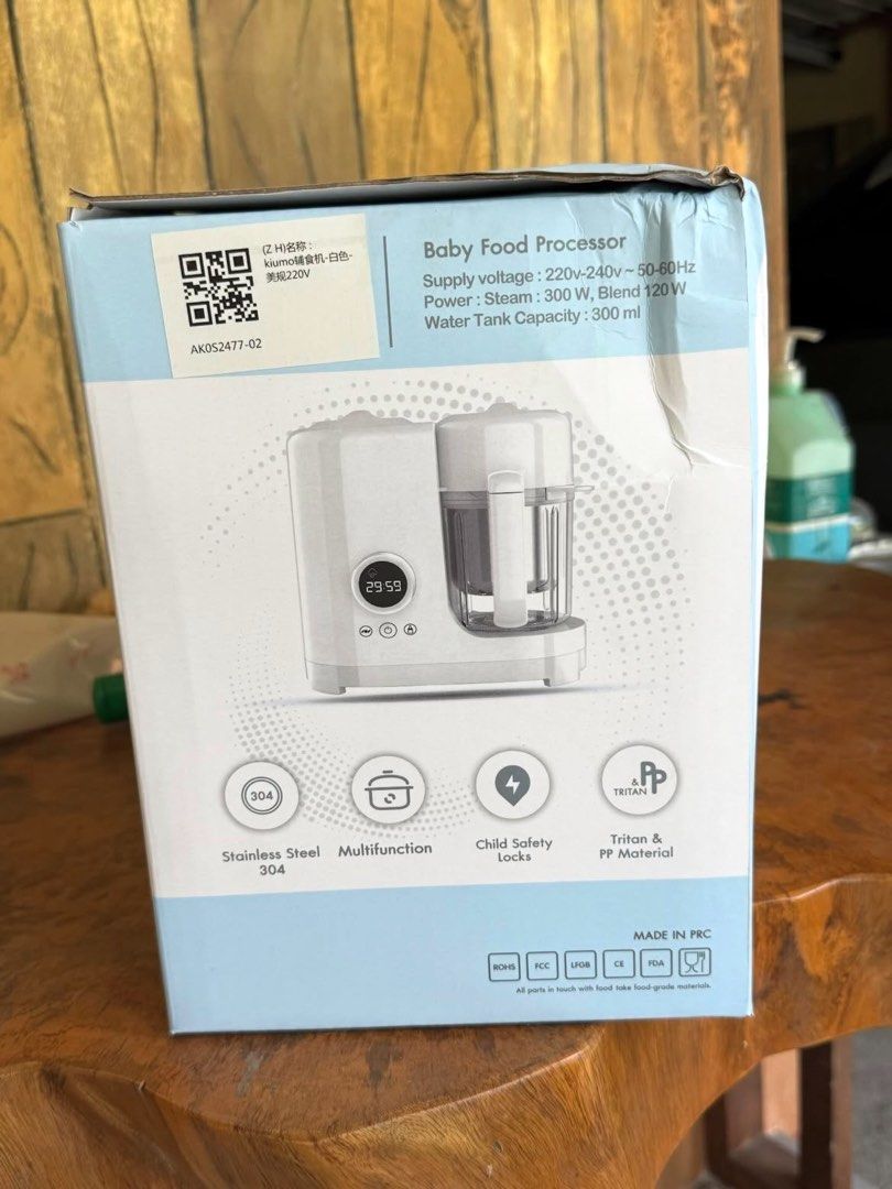 Kiumo Baby Food Processor (Category: Weaning & Toddler Feeding) located in Imus. Submitted by pacific.mermaids (Listing ID 1431925198, Image 3). Description: - Multifunctional: Steam, blend, sterilize, and warm baby food. - Powerful: 300W steam function, 120W blend function. - Safe Materials: Made with 304 stainless steel and Tritan/PP. - Child-Safe: Features child safety locks. - Easy to Clean: Designed for convenient cleaning. - Large Capacity: