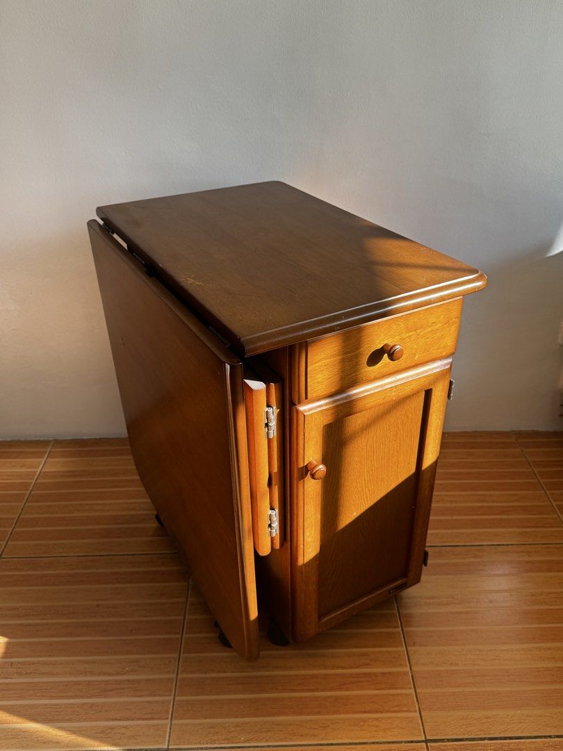 KOIZUMI Wood extendable collapsible table with wheels (Category: Tables & Sets) located in San Juan City. Submitted by anca.shoppes (Listing ID 1431885722, Image 3). Description: KOIZUMI H26.5" W23" L38" Study table, Work/Office table, Sewing Table, Side table Collapsible, Expandable, Foldable Midcentury, vintage table Bought from Japan Surplus for ₱7,000 Signs of use (scratches, discoloration, etc), missing 1-2 screws.