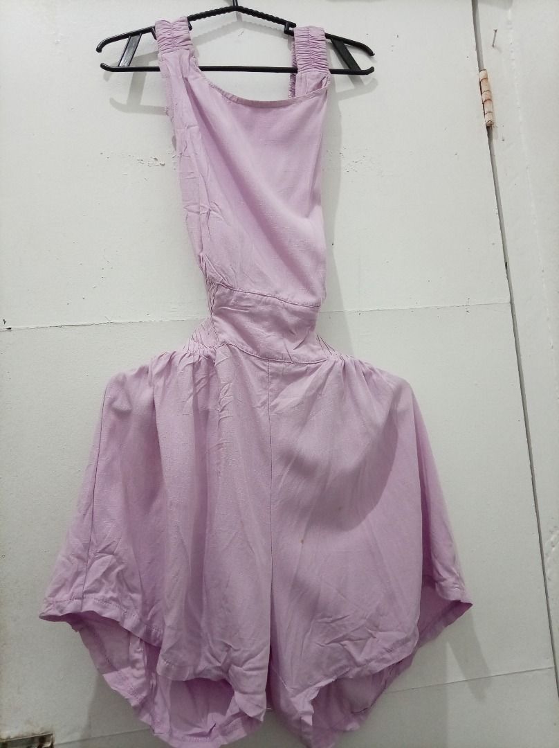Lavender Romper with Cutout Detail (Category: Rompers) located in Guinobatan. Submitted by thegirlwhosellstuff (Listing ID 1431795453, Image 1). Description: - Lavender romper with a unique cutout design. - Halter-style top with gathered straps. - Flowy shorts bottom. - Subtle textured fabric. - Stylish and comfortable fit. - Perfect for warm weather. -Never been worn, comes with ziplock bag -Need ironing.