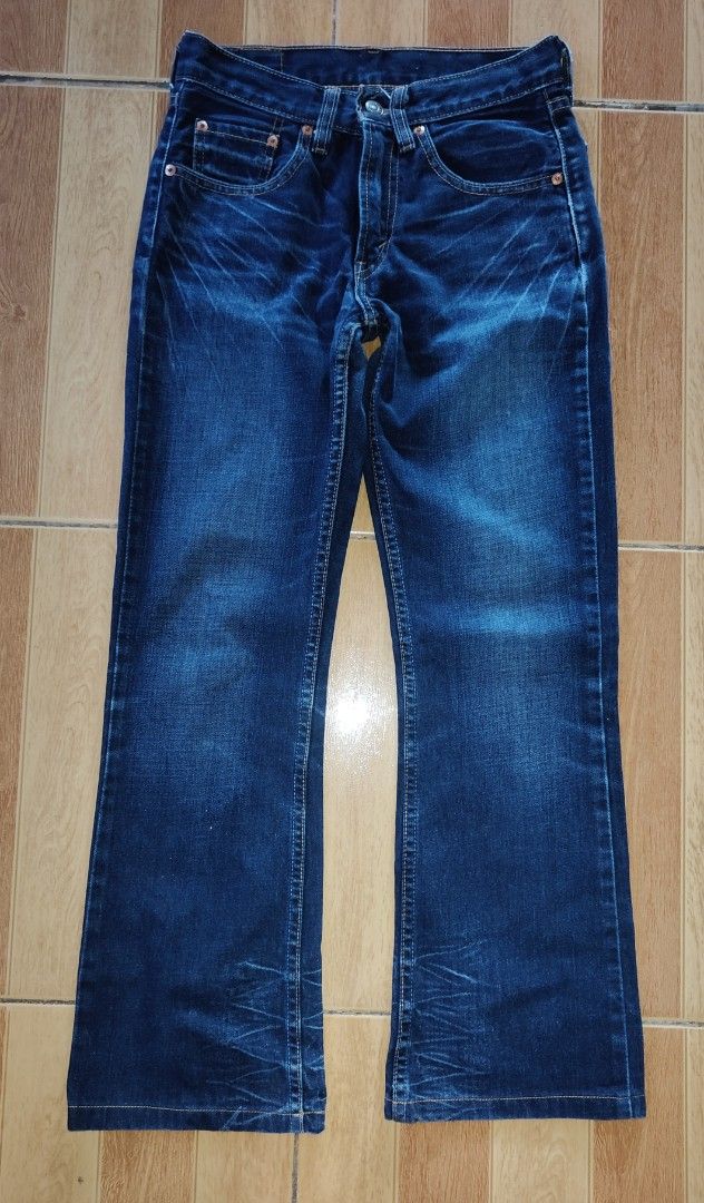 Levi's Dark Wash Jeans (Category: Jeans) located in Kabankalan. Submitted by stylesavy (Listing ID 1431828900, Image 1). Description: - Classic Levi's jeans -size:25 to 26 - Dark wash - boot cut - Five-pocket design - Iconic Levi's red tab - Levi's logo patch - Well-maintained.