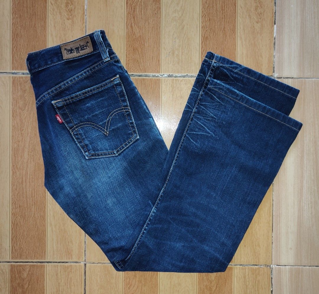 Levi's Dark Wash Jeans (Category: Jeans) located in Kabankalan. Submitted by stylesavy (Listing ID 1431828900, Image 2). Description: - Classic Levi's jeans -size:25 to 26 - Dark wash - boot cut - Five-pocket design - Iconic Levi's red tab - Levi's logo patch - Well-maintained.