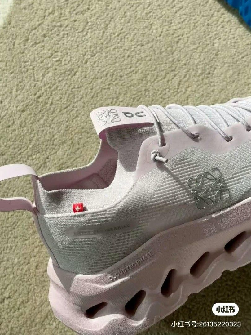 Loewe x On Cloudtilt Sneakers - Pink (Category: Sneakers) located in Bulacan. Submitted by thinetine (Listing ID 1431872614, Image 3). Description: - Loewe x On collaboration sneakers - Eye-catching pink color - Features Loewe logo - Distinctive sole design with visible CloudTec Phase technology - Comes with original box - Unworn condition.