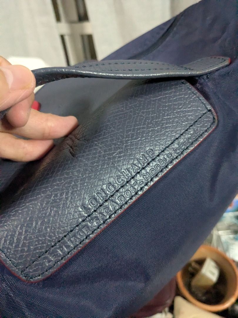 Longchamp Le Pliage Club Briefcase Bag (Category: Luxury Bags & Wallets) located in Quezon City. Submitted by nnncorner (Listing ID 1431991407, Image 3). Description: Original Longchamp Le Pliage Club Briefcase Bag 8.8/10 condition minimal issue, small flaw on handle (unnoticeable and doesn't affect the use of this bag) but please bawal sa maselan Original price almost 15k 100% original Message me for detailed pic for patterns, logo, snaps and zi