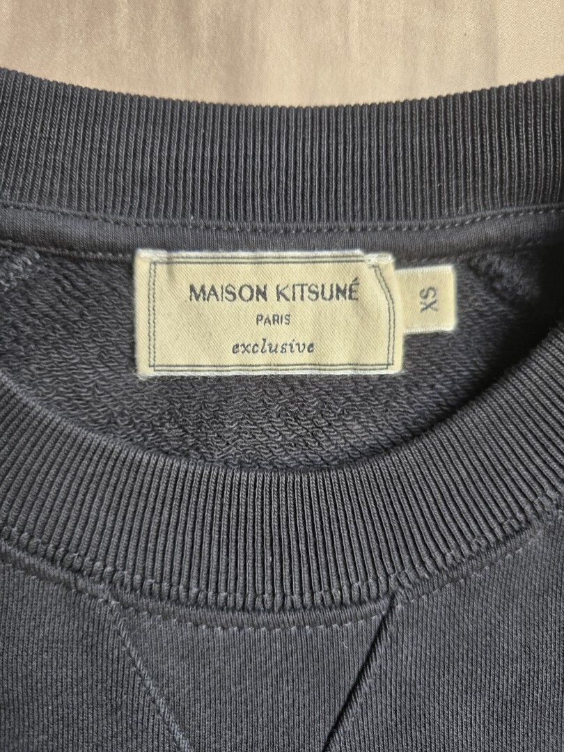 Maison Kitsune X SSENSE Exclusive Fox Head Sweatshirt (Category: Coats, Jackets and Outerwear) located in Caloocan City. Submitted by pinksushiswift (Listing ID 1431803958, Image 3). Description: - Authentic Maison Kitsune sweatshirt - Used twice! - Size: XS - Features the iconic fox head patch - Bought from SSENSE for 190 USD - RFS: Decluttering MOP: GCash.