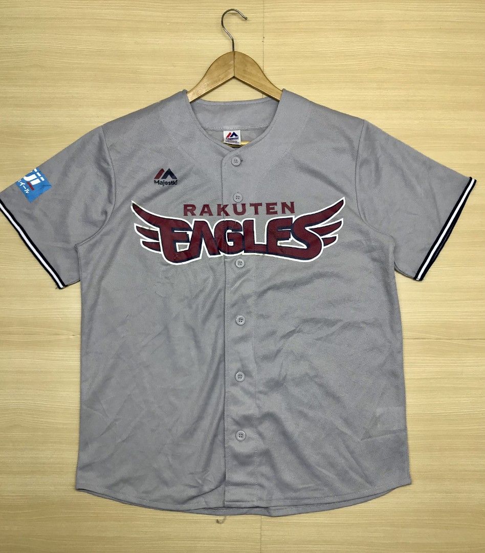 Majestic Rakuten Eagles Baseball Jersey (Category: Tshirts & Polo Shirts ) located in Manila. Submitted by hitsforfits (Listing ID 1431981822, Image 1). Description: • Rakuten Eagles Gray Baseball Jersey 📏 Size: M 📏 Dimes: 21 x 26.5 ₱ 299 - Gray Rakuten Eagles baseball jersey - Brand: Majestic - Features team name and logo on the front - Includes Fuji logo on the sleeve - Button-up closure - Short sleeves with white and navy trim - Visible tag 