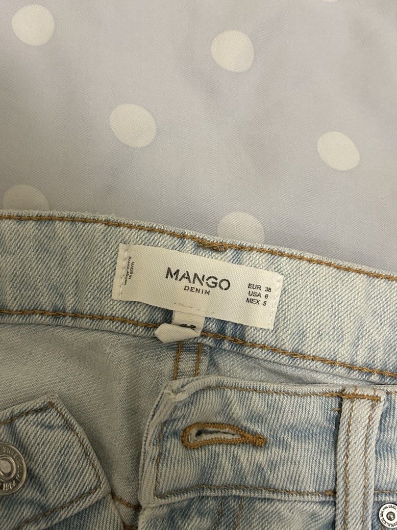 Mango Denim Shorts (Category: Shorts) located in Quezon City. Submitted by bea30 (Listing ID 1431955993, Image 3). Description: - Mango denim shorts - Light wash - Size US 6 (M) - Light blue color - Raw hem - Classic five-pocket design - Button and zipper closure - No flaws, just decluttering.