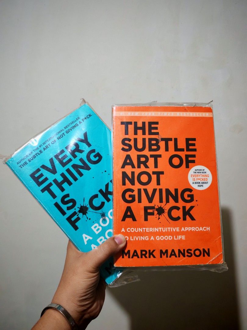Mark Manson Books (Category: Storybooks) located in Rizal. Submitted by deejbookshop (Listing ID 1431862050, Image 1). Description: Two books by Mark Manson are available. The titles are "Everything is F*cked: A Book About Hope" and "The Subtle Art of Not Giving a F*ck: A Counterintuitive Approach to Living a Good Life"..