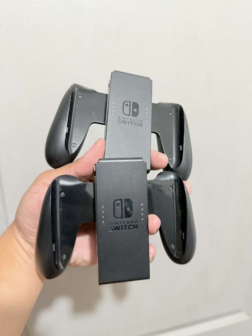 Nintendo Switch Joy-Con Controller Set (Category: Controllers) located in Quezon City. Submitted by monlorenz (Listing ID 1431808290, Image 1). Description: For Sale Nintendo Switch Joy Con Grip Price: 400 "Each" Unli test upon Meetup Meet up Sm Mega Mall or Sm Fairvew.