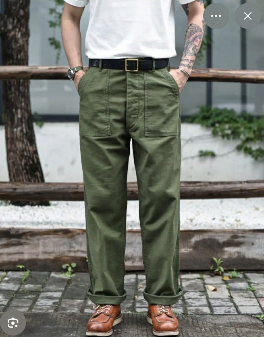 Olive Green Military Style Pants (Category: Jeans) located in General Santos City (Dadiangas). Submitted by markinho_ideas (Listing ID 1431943771, Image 1). Description: - Olive green military-inspired pants - High-waisted fit - Straight leg cut - Multiple pockets - Button fly - Durable construction - Perfect for a casual, rugged style - Versatile wardrobe addition.