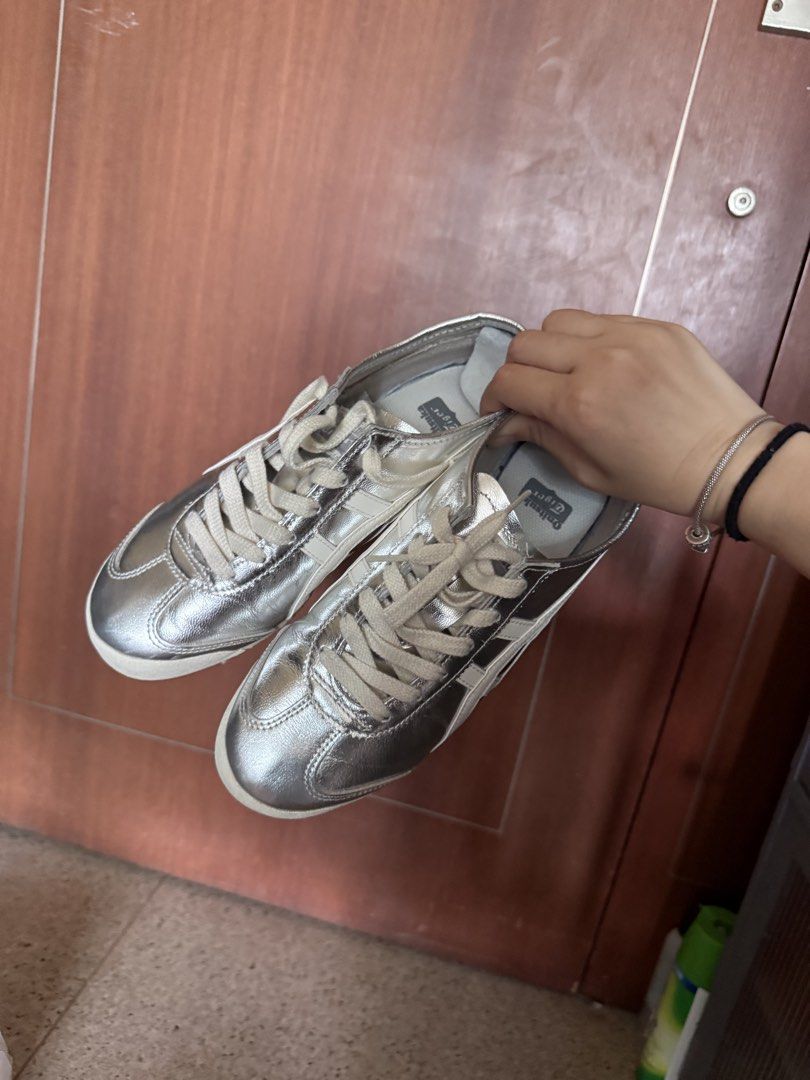 Onitsuka Tiger Mexico 66 Silver Sneakers (Category: Sneakers) located in Singapore. Submitted by 333choiyj (Listing ID 1431909609, Image 3). Description: - Unisex Silver Onitsuka Tiger Mexico 66 sneakers - Worn less than 5 times! - Adds a touch of shine to any outfit - Comfortable and fashionable - Perfect for everyday wear - still in very good condition! size EUR 40 .