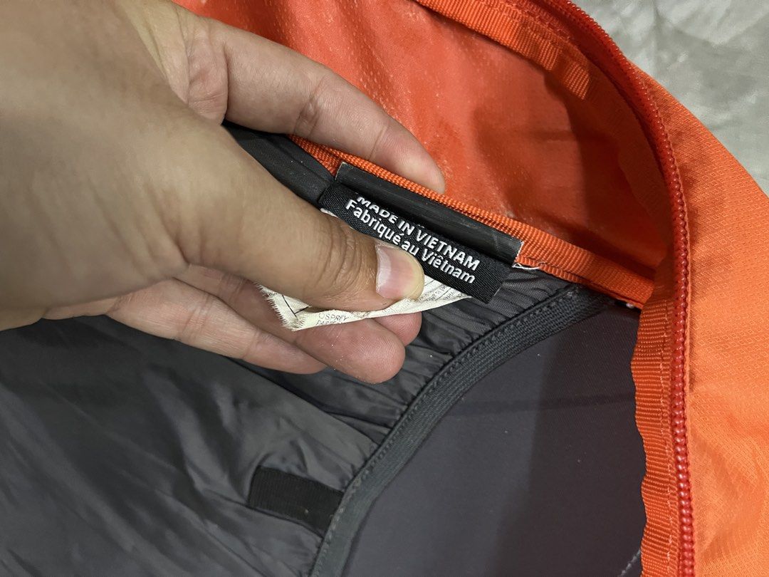 Osprey Hikelite 26 Backpack (Category: Backpacks) located in Bulacan. Submitted by sef19 (Listing ID 1431799117, Image 3). Description: - Osprey Hikelite 26 backpack - Color: Orange - Size: O/S (15-22 in) - Features: - Main compartment with hydration sleeve - Adjustable shoulder straps - Breathable back panel - Multiple compartments - Made in Vietnam - Ideal for hiking and outdoor activities.