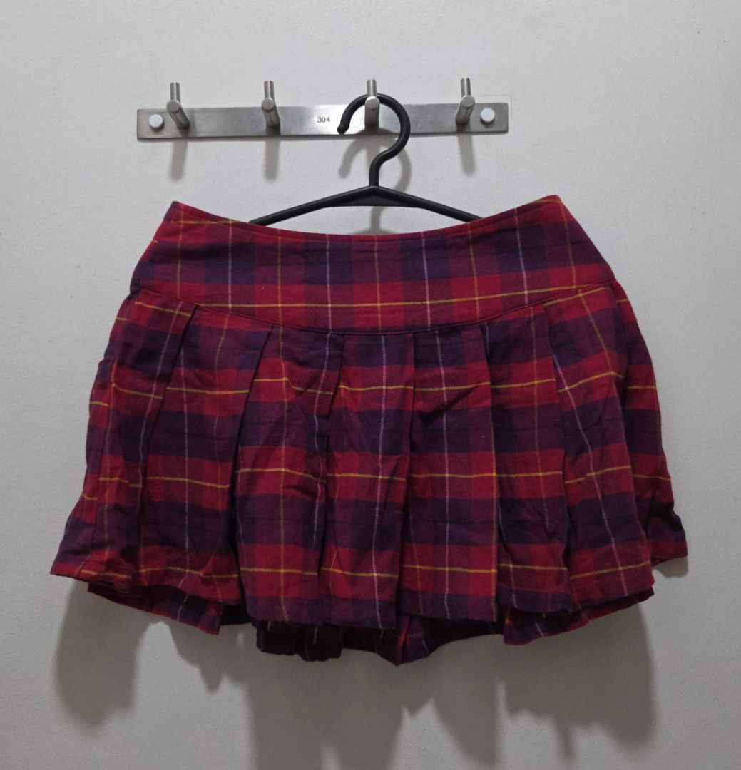 Plaid Pleated Mini Skirt pink & violet (Category: Skirts) located in Manila. Submitted by janrsll (Listing ID 1431833902, Image 1). Description: - Classic plaid pattern (red, purple, yellow) - Pleated design - Comfortable fit - Versatile for casual or dressy looks - Easy to pair with different tops and shoes - Stylish addition to your wardrobe.