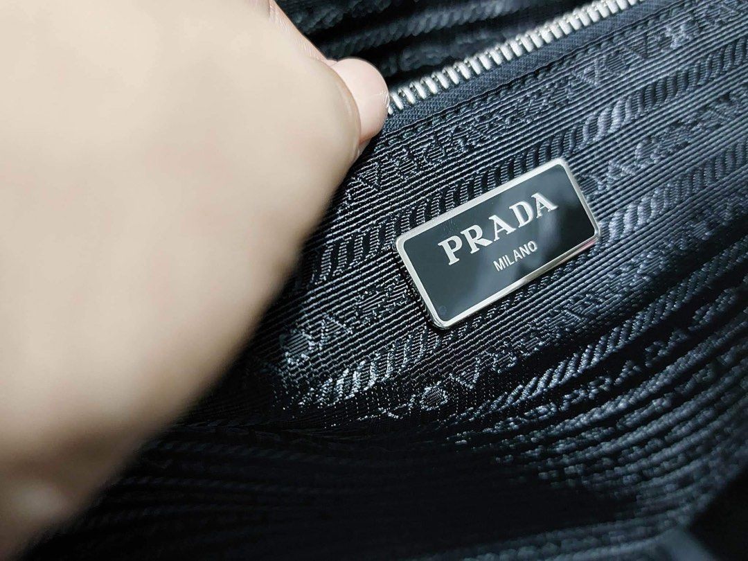 Prada Black Rolling Suitcase (Category: Luxury Bags & Wallets) located in Caloocan City. Submitted by prelovedbymaria27 (Listing ID 1431910476, Image 3). Description: .