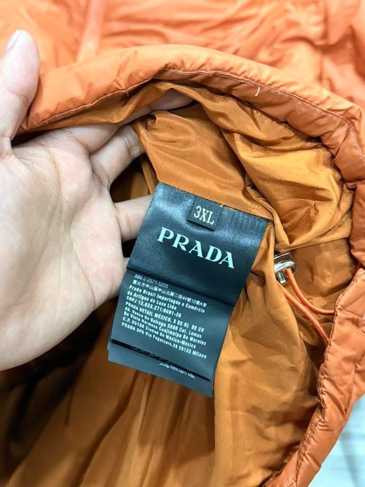 PRADA PUFFER JACKET (Category: Luxury Apparel) located in Baguio. Submitted by lairdegawd_06 (Listing ID 1431954808, Image 3). Description: Dimensions: 26x28 Condition: excellent Color Rate: 10 Check photos for more details.
