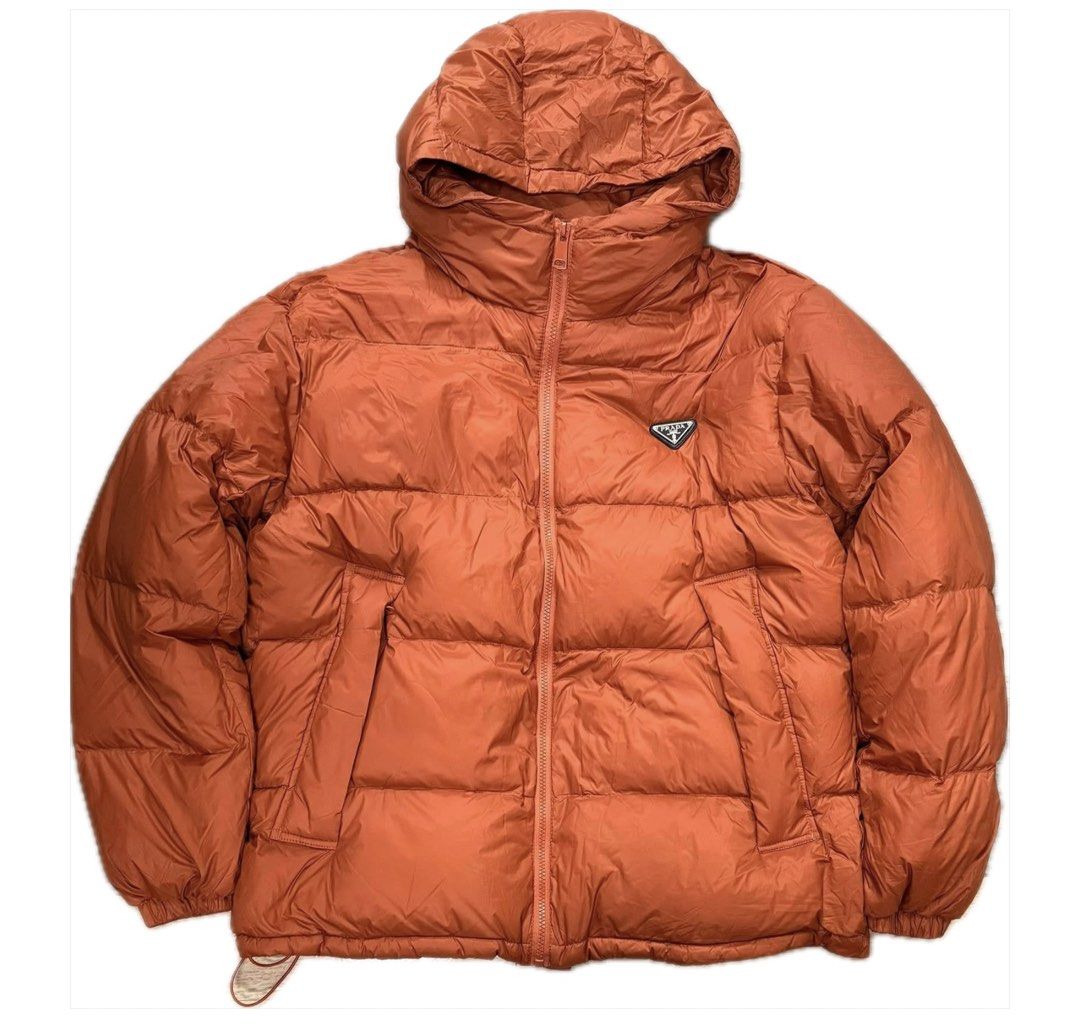 PRADA PUFFER JACKET (Category: Luxury Apparel) located in Baguio. Submitted by lairdegawd_06 (Listing ID 1431954808, Image 1). Description: Dimensions: 26x28 Condition: excellent Color Rate: 10 Check photos for more details.