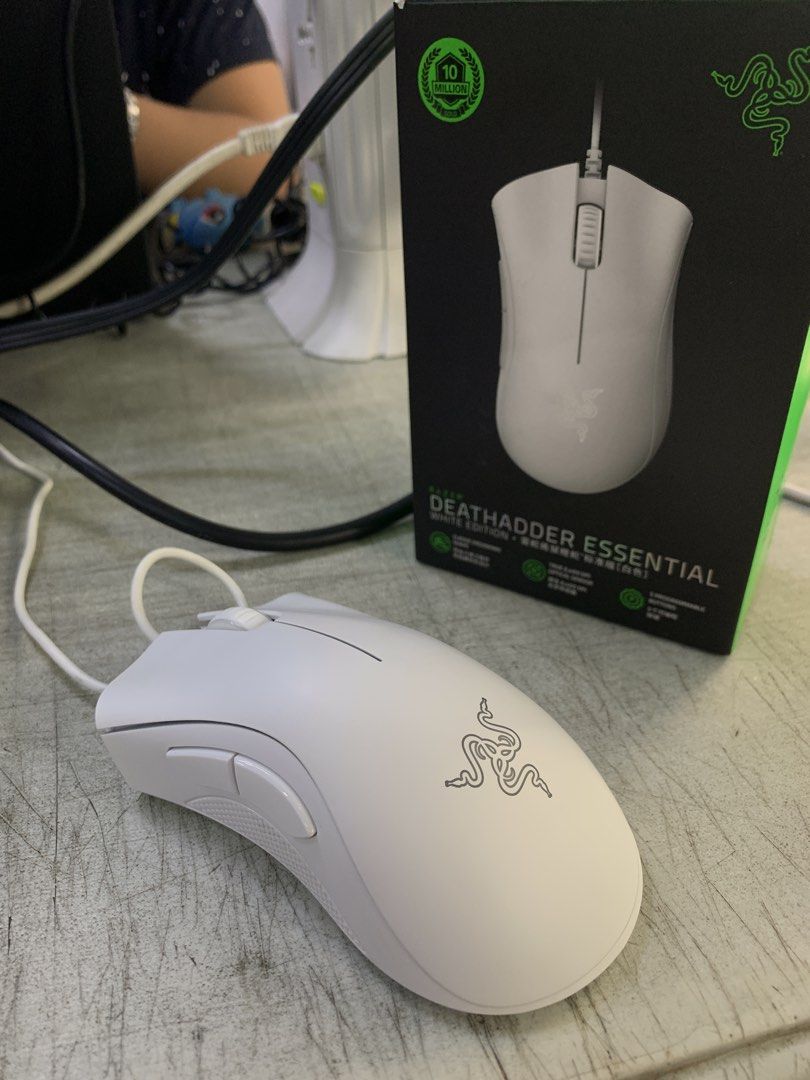 Razer DeathAdder Essential White Edition (Category: Mouse & Mousepads) located in Manila. Submitted by justin.580 (Listing ID 1431863360, Image 1). Description: ORIGINAL PRICE: $29.99 I HAD IT SINCE JANUARY 2026 BUT DOESNT USE IT - Razer DeathAdder Essential gaming mouse - Features Razer logo - Two side buttons - Wired connection - Comes with original box.