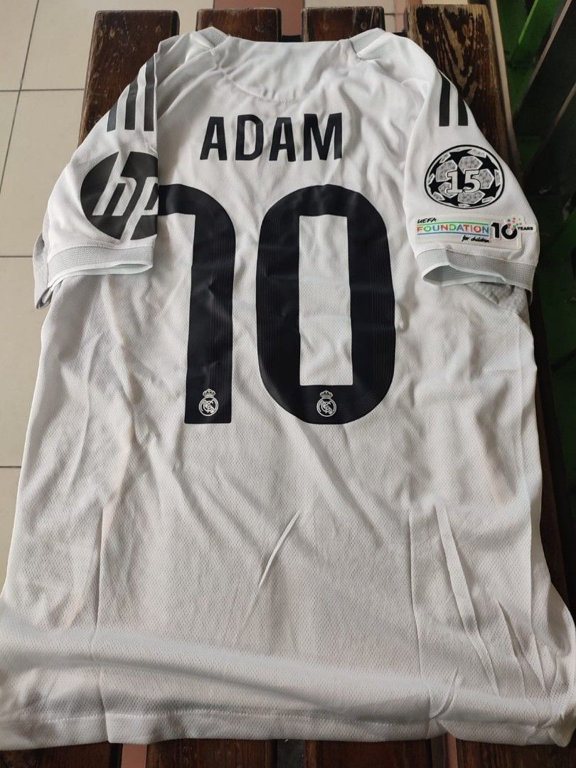 Real Madrid home longsleeve with nameset+patches jersey (Category: Activewear) located in Singapore. Submitted by sgapparel (Listing ID 1431970098, Image 1). Description: jersey comes with tagged material:drifit size s m l xl Item send using register mail takes 2-3 working days.